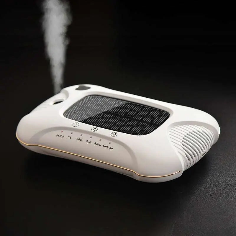 White solar car air purifier with sleek rounded design gold trim and green led indicators for vehicle use