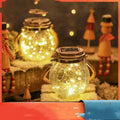 A golden-framed solar crackle glass small night light with warm glowing fairy lights for ambient light