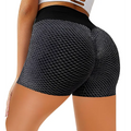 Black mesh-patterned high-waisted solid color workout shorts featuring honeycomb design yoga shorts with elastic waistband