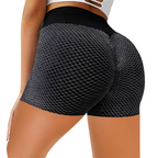 Black mesh-patterned high-waisted solid color workout shorts featuring honeycomb design yoga shorts with elastic waistband