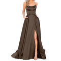 Elegant purple satin evening gown with a square neckline, thin straps, and a high slit for a slimming effect