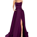 A flowing purple satin evening gown with a fitted bodice and high slit perfect for formal occasions