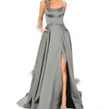 A sleek purple satin evening gown with a fitted bodice and high slit in a floor-length slimming design