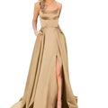 A shimmering gold satin evening gown with a fitted bodice, high slit, and flowing train, perfect for formal occasions