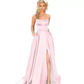 A flowing light pink satin evening gown with square neckline and high slit for elegant occasions
