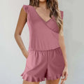 A soft mauve color printing bikini ruffled romper swimwear with shoulder ruffles and a flared hem design