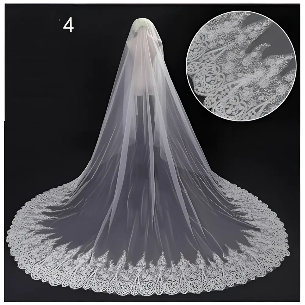 A delicate white lace wedding dress veil with an intricate floral scalloped edge for bridal wedding dress use