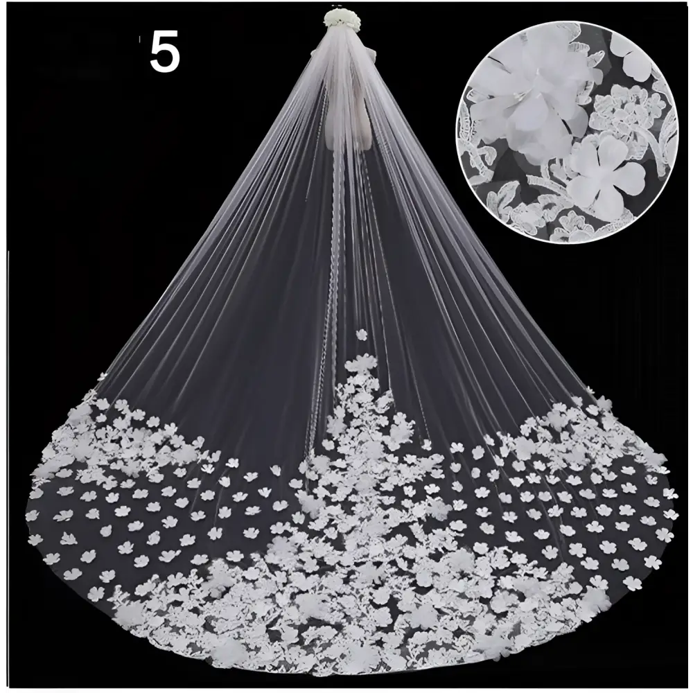 A delicate white sparkling wide style bridal wedding dress veil with intricate floral lace appliqués and decorative flower detail