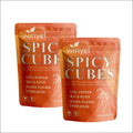 Orange pouches of winyel spicy cubes gummies designed for hormonal balance and improving energy levels and intimate health