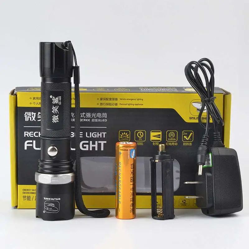 Black spiked tactical self-defense led flashlight with textured grip, silver accent ring, and wrist strap for secure handling