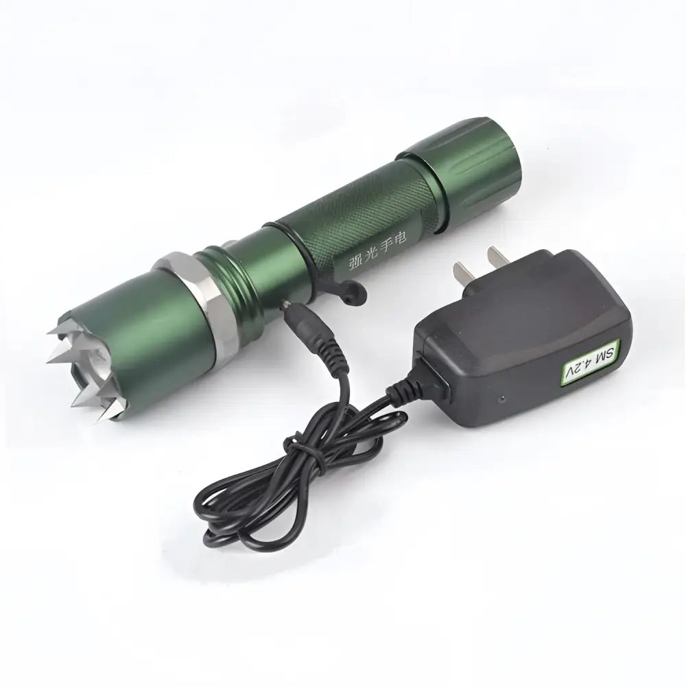Green spiked tactical self-defense led flashlight with textured grip and black charging adapter for reliable use
