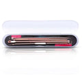 Rose gold-toned steel beauty needle set with textured handles neatly arranged in a clear zippered case