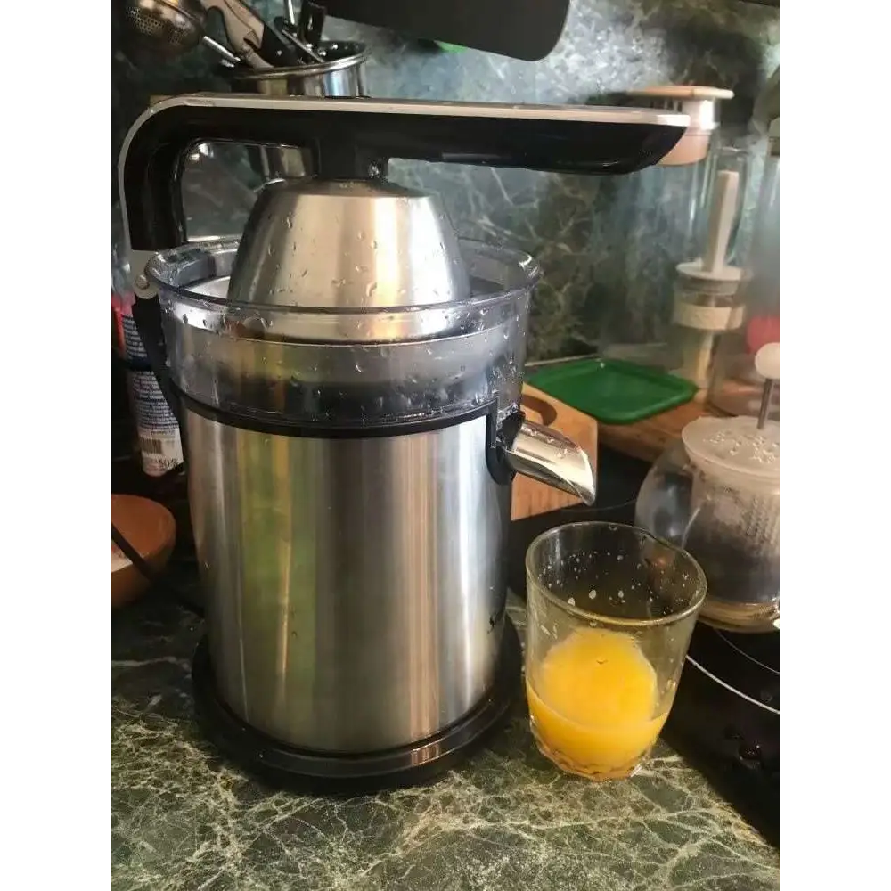 Stainless steel electric lemon juicer with black plastic accents for efficient lemon juicing and modern design