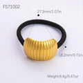 Gold-toned stainless steel flower elastic hair tie with ribbed design and black elastic band for decorative use