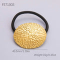 Gold-toned stainless steel flower elastic hair tie with embossed leaf pattern and black elastic band for secure hold