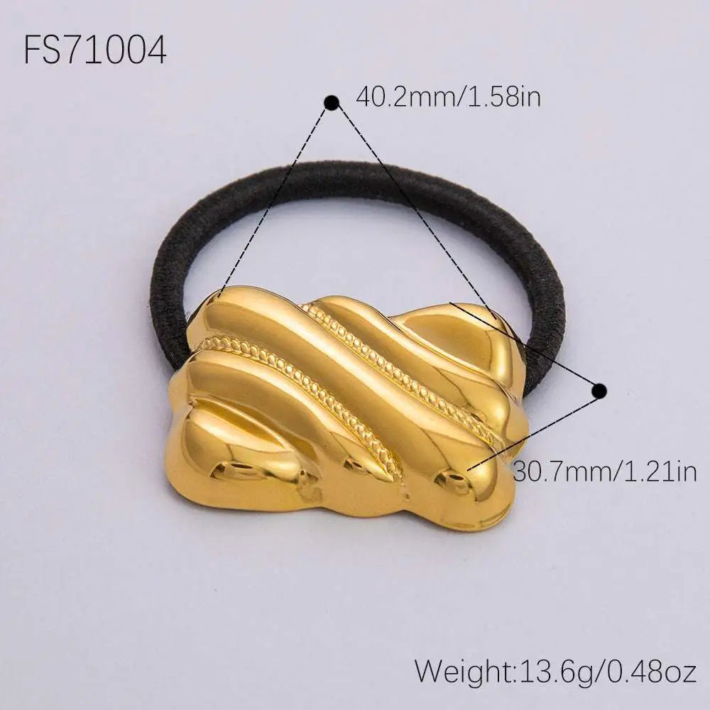 Gold-colored stainless steel flower elastic hair tie with intricate braided texture and black elastic band for hair styling