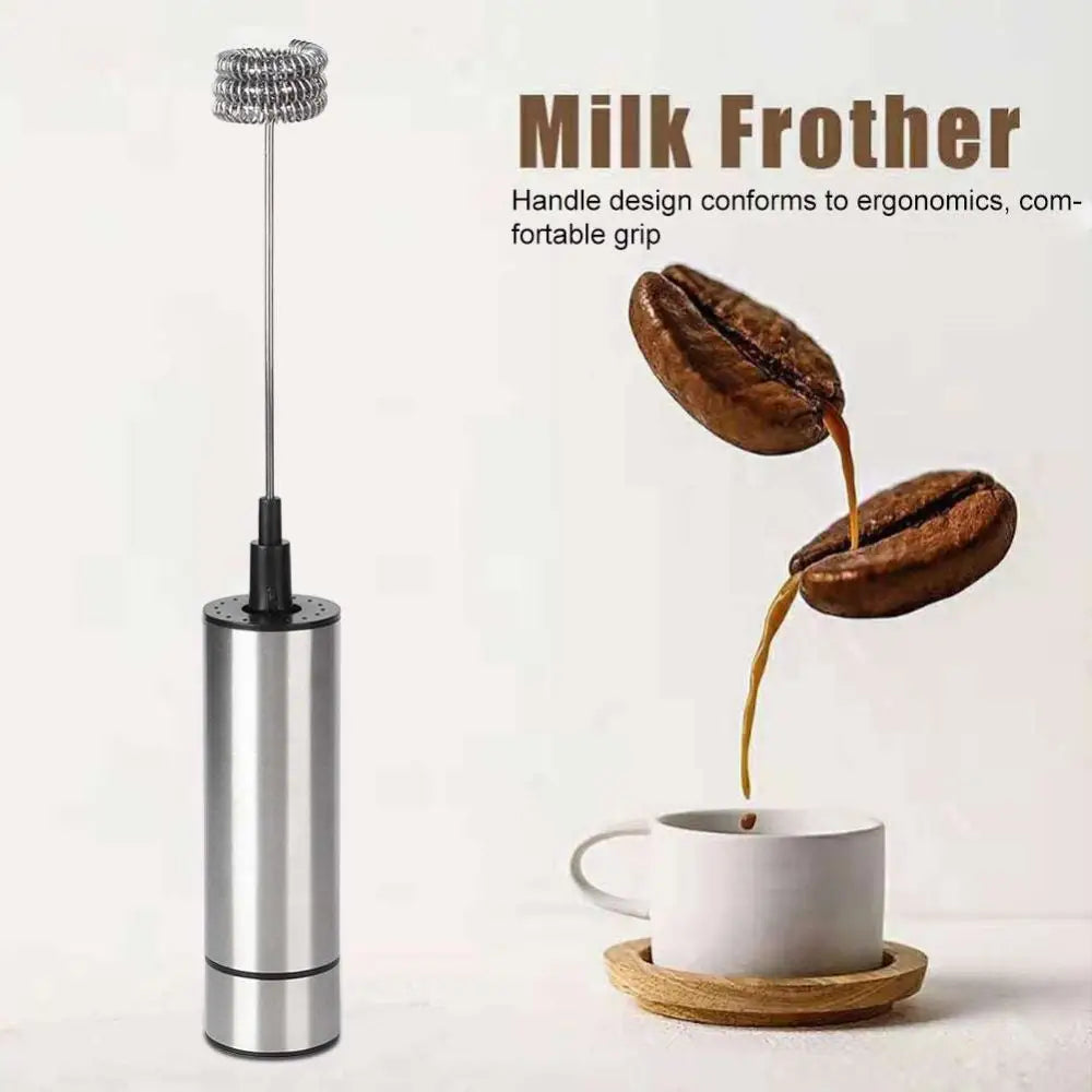 Silver stainless steel milk frother and coffee stirrer with a sleek cylindrical body and spiral whisk attachment