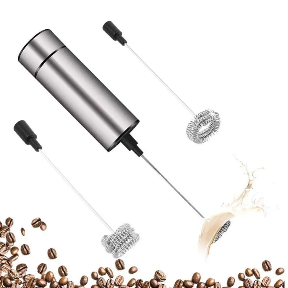 Silver stainless steel milk frother and coffee stirrer with two detachable whisk attachments for versatile use as egg beater