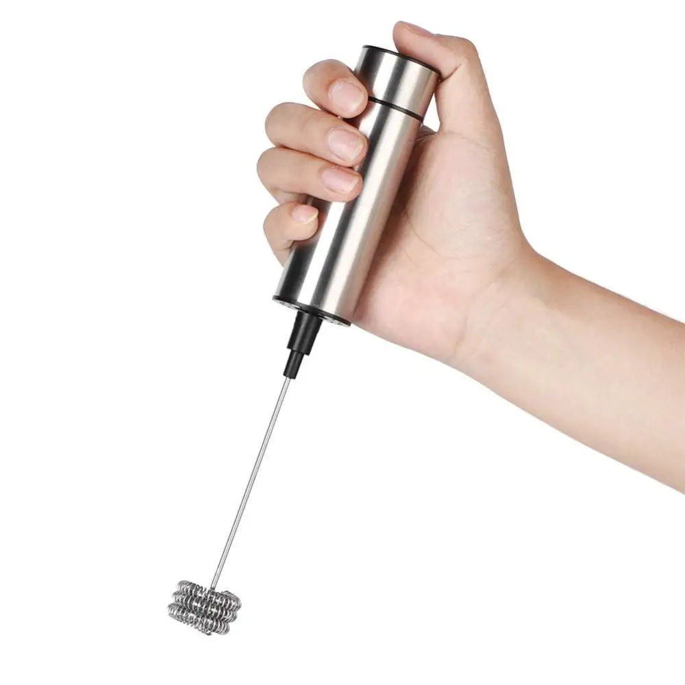 A sleek stainless steel milk frother and coffee stirrer with a coiled wire whisk for use as an egg beater