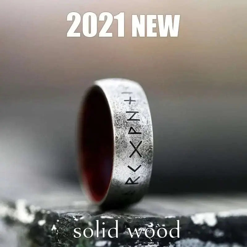 A stainless steel Odin Norse rune ring with engraved symbols and a dark red solid wood interior for men’s fashion stainless style