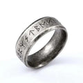 A silver-toned stainless steel Odin norse rune ring featuring engraved runic symbols for men’s fashion stainless jewelry