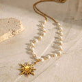 Stainless steel pearl necklace featuring a gold sun pendant with small white pearls for elegant wear