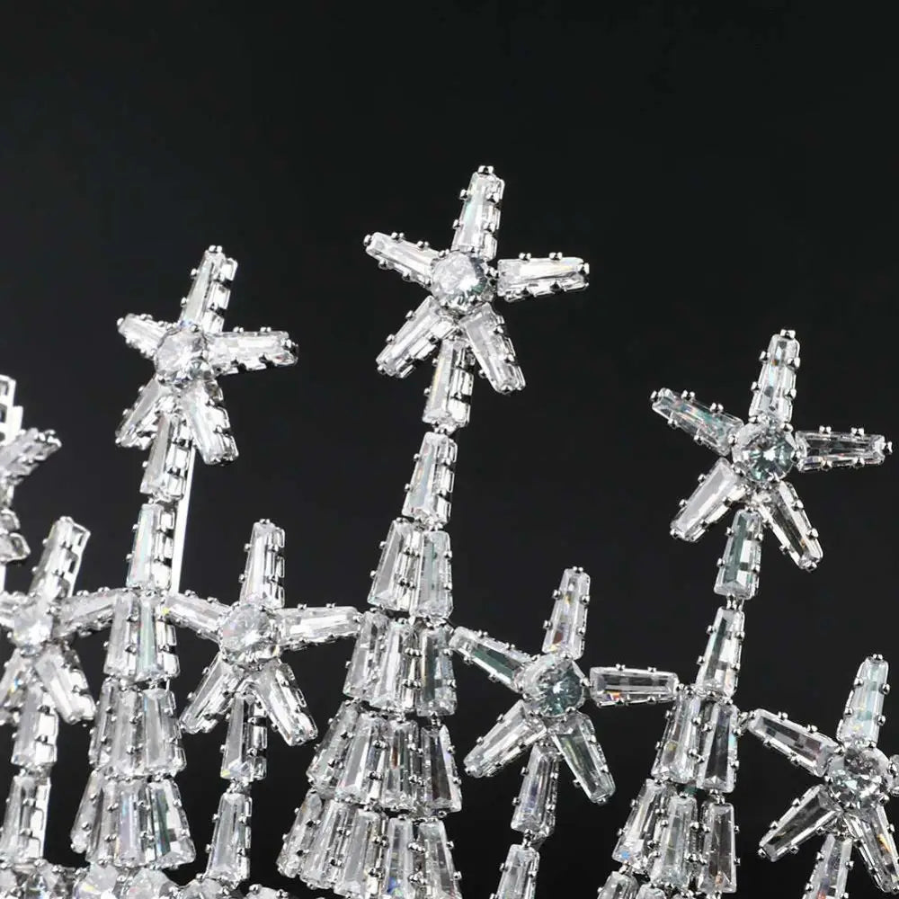 A sparkling silver zircon headdress with star-shaped embellishments and cascading stones for formal dress accessories