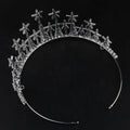 Silver zircon headdress with intricate cross and star-shaped embellishments for formal dress accessories