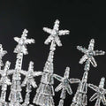 A sparkling silver zircon headdress with star-shaped embellishments and cascading tiers for formal dress accessories