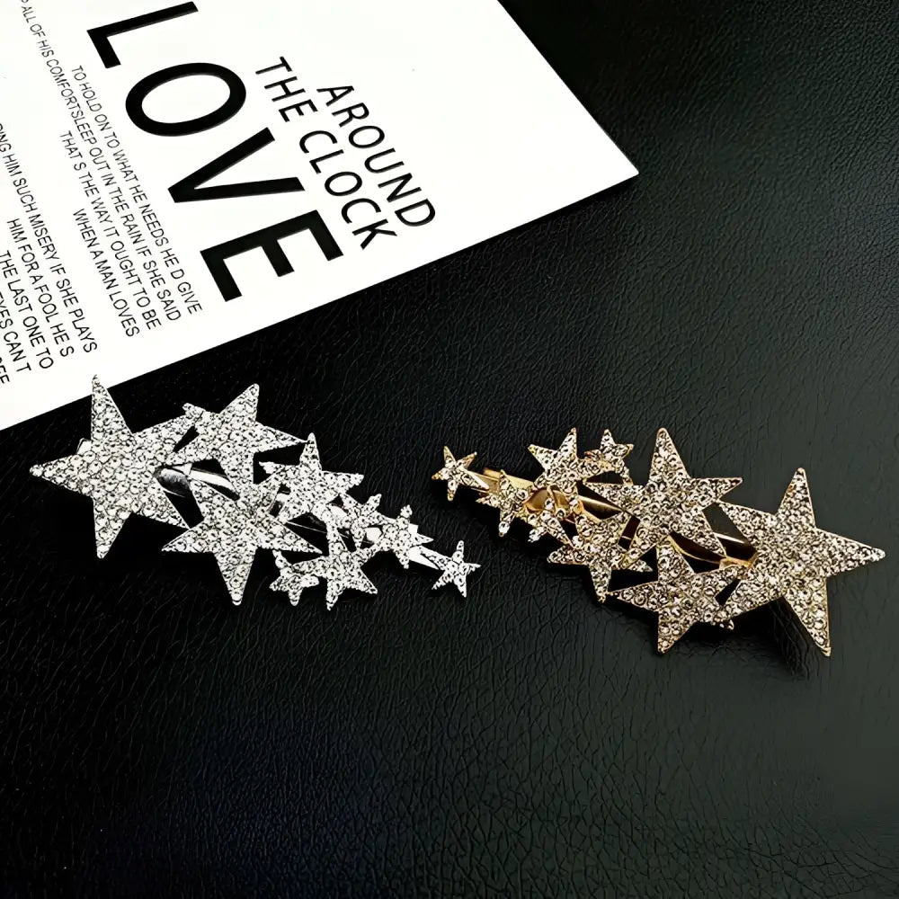 Sparkling star diamond barrettes in silver and gold tones adorned with small pentagrams for pentagrams head styling