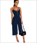 Navy blue strap jumpsuit with button front and wide-leg cropped pants for luxury women’s fashion