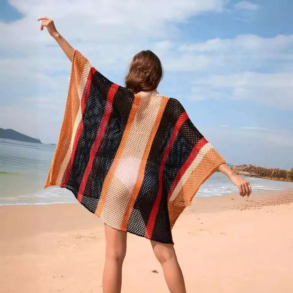 Colorful knitted striped loose plus size bikini blouse with bold vertical stripes in red blue green beige and white