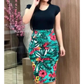 Striped printed office midi pencil dress with vibrant tropical print of green leaves and multicolored flowers on white background