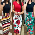 Three women model black short-sleeved tops with striped printed office midi pencil skirts in bold patterns