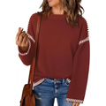 A cozy maroon round neck pullover knit sweater with white striped accents on sleeves and hem
