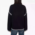 Black knit round neck pullover knit sweater with white striped trim on shoulders sleeves and hem