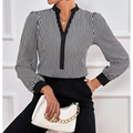 Black and white vertically striped blouse with black cuff collar color block splicing and contrasting front placket