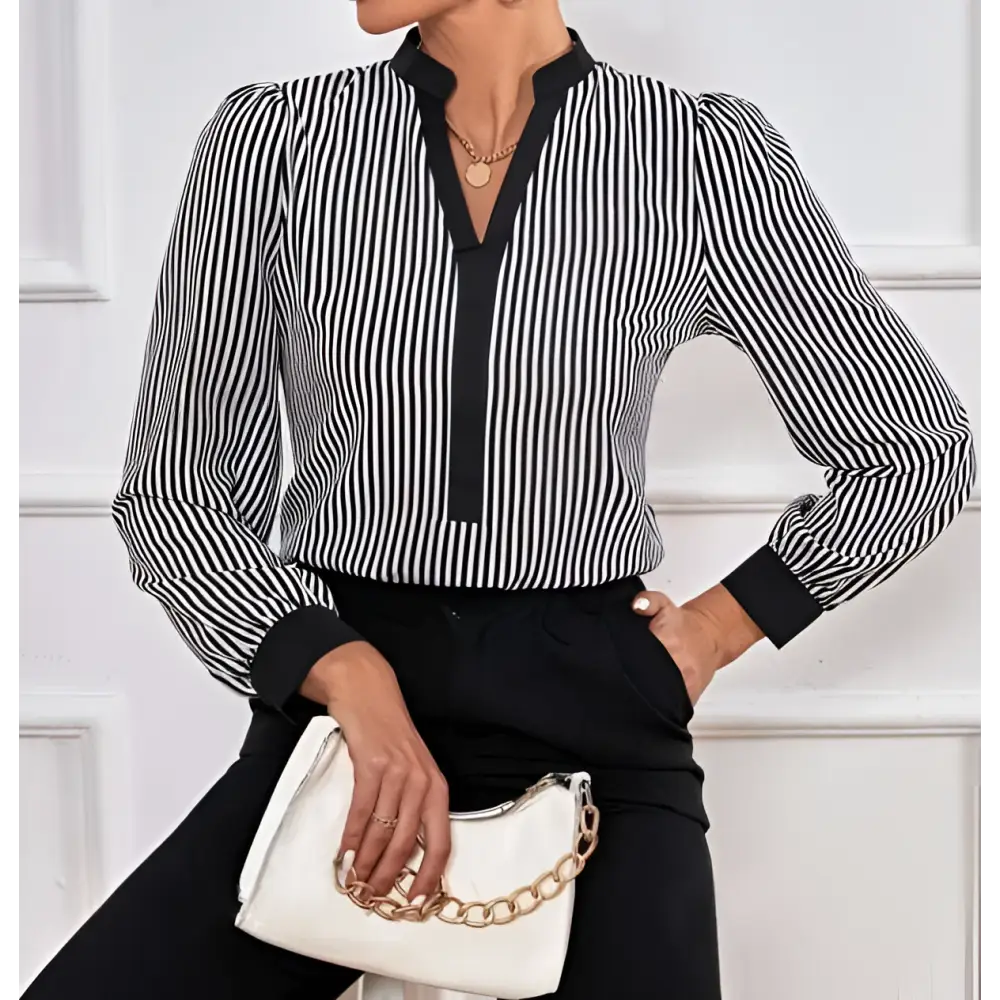 Black and white vertically striped blouse with black cuff collar color block splicing and contrasting front placket