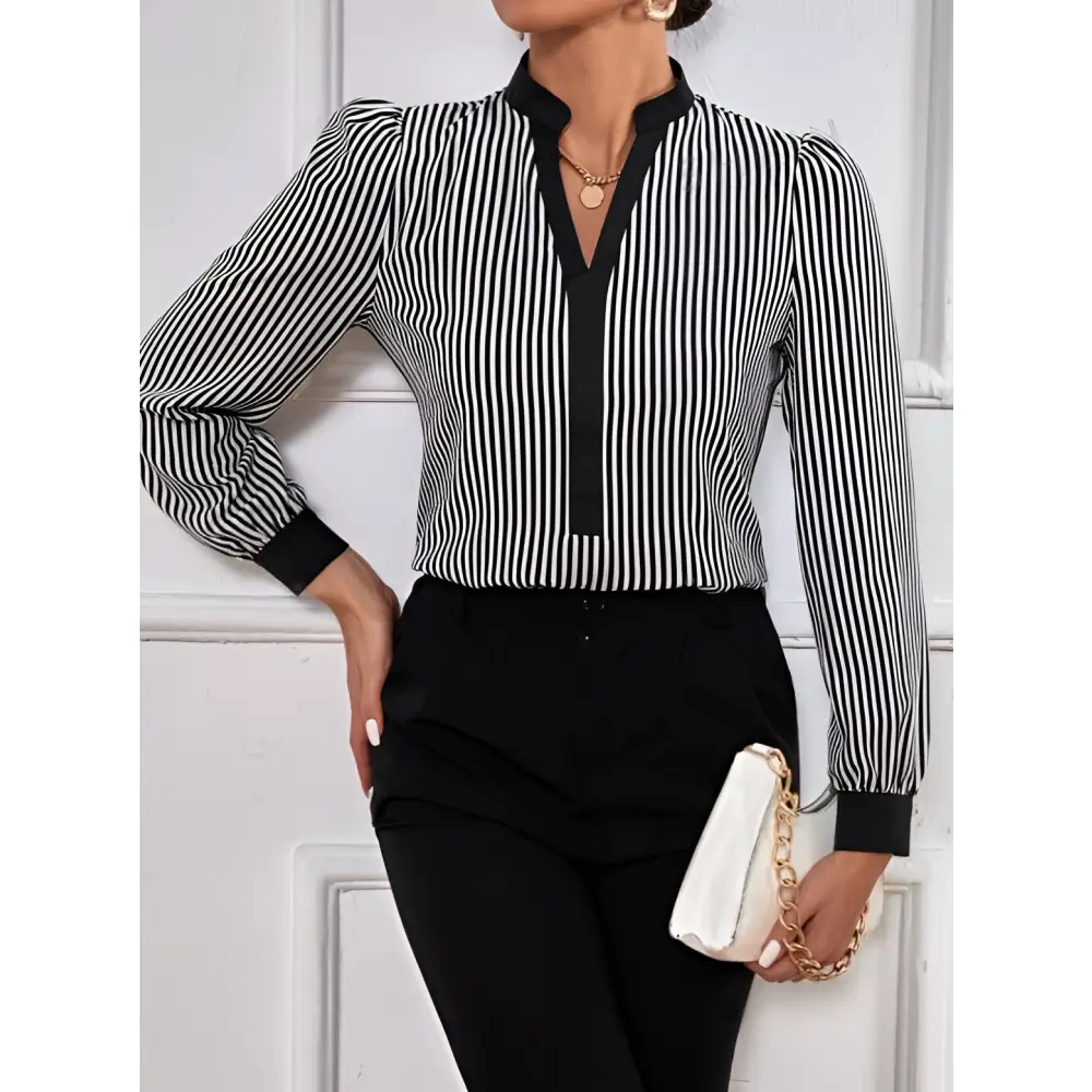 Black and white vertically striped long-sleeved block splicing shirt with cuff collar color and contrasting front placket