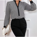 Black and white vertically striped long-sleeved block splicing shirt with v-neckline and cuff collar color trim