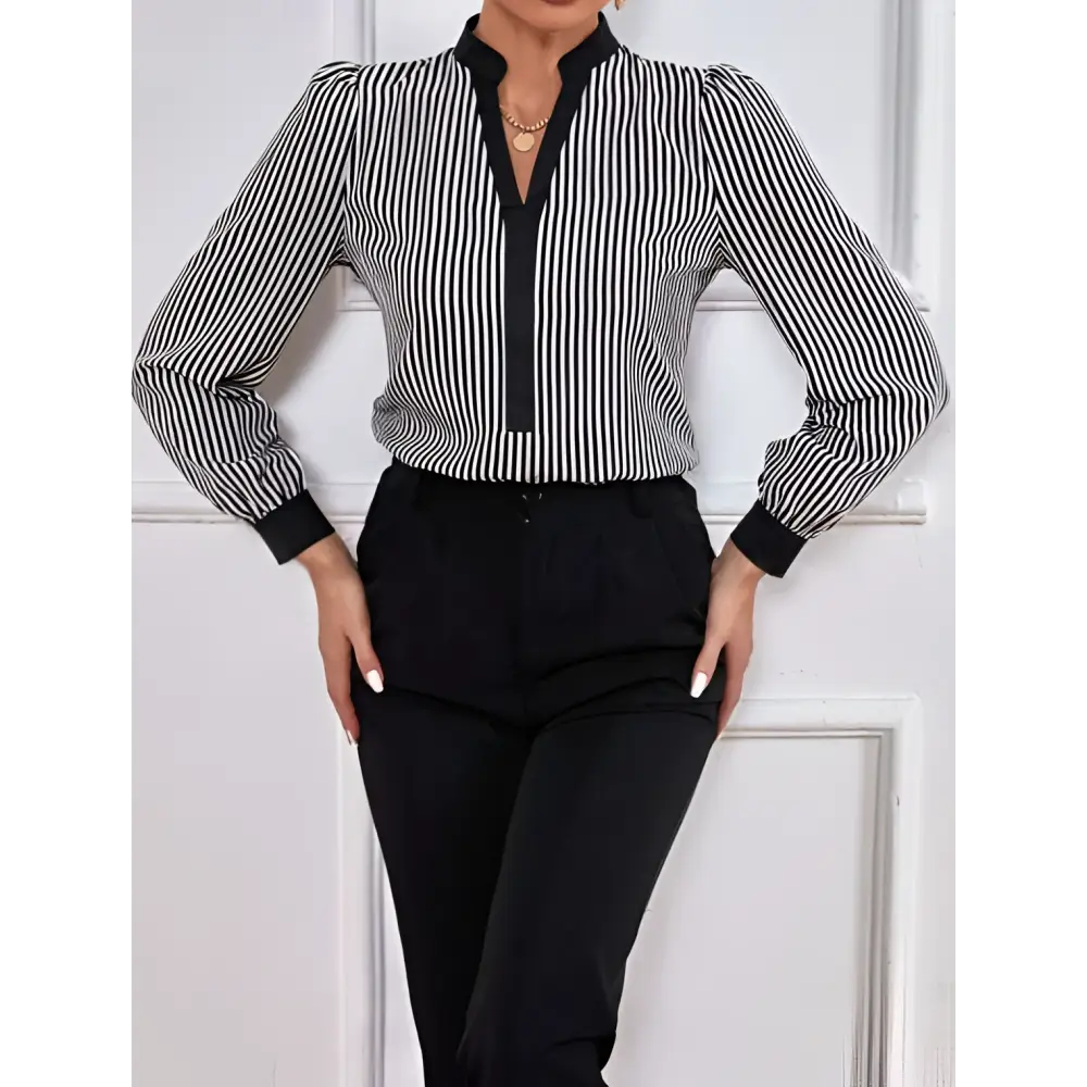 Black and white vertically striped long-sleeved block splicing shirt with cuff collar color and black placket details