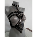 Black leather studded leather harness with silver studs and metal rings for perform dance costume use