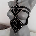 Black leather studded leather harness adorned with silver studs and chains for harness perform dance costume use