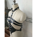Black leather studded leather harness with silver metal chains and rings designed for harness perform dance use