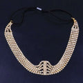 Gold-toned layered rhinestone headband with multiple sparkling clear rhinestone rows and black elastic band for princess elastic multi style