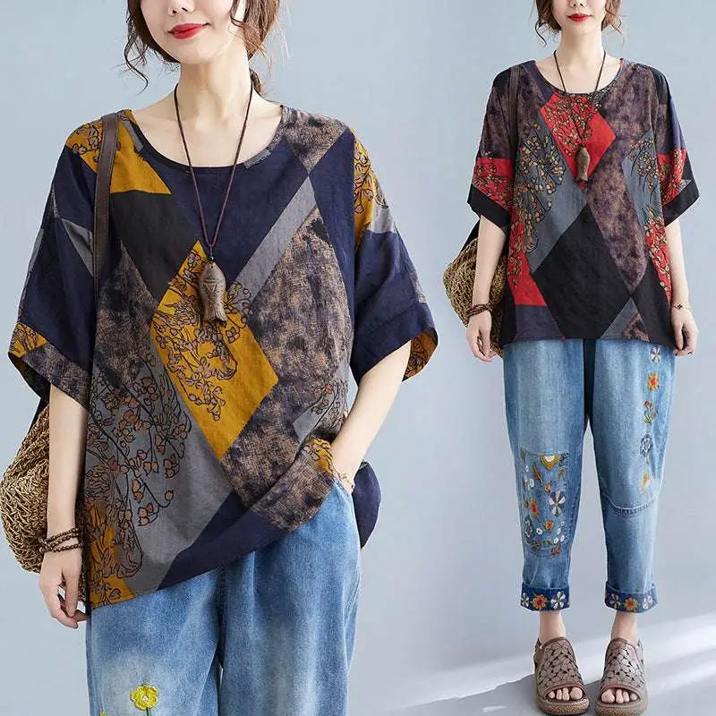 Stylish loose round neck printed patchwork blouse with bold geometric panels in navy, mustard, and brown tones with floral embroidery