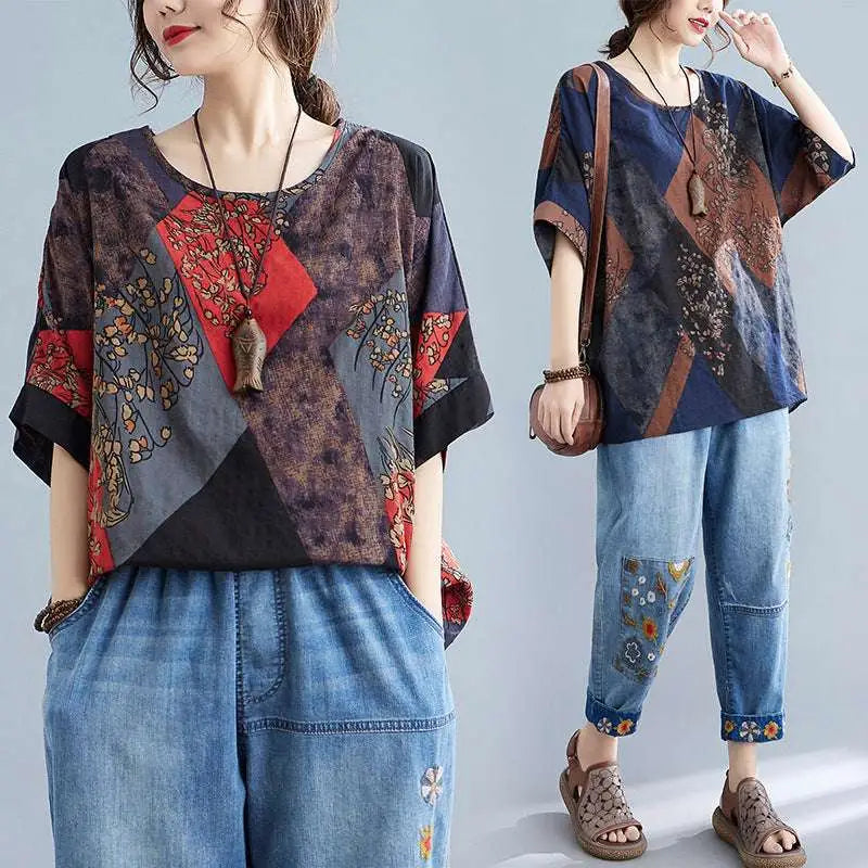 Stylish loose round neck printed patchwork blouse with bold geometric panels in deep blue rust red and brown tones with floral embroidery