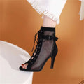 Black mesh and suede ankle boot with stylish peep toe, hollow mesh design, lace-up front, buckle detail, and high heel dance heels