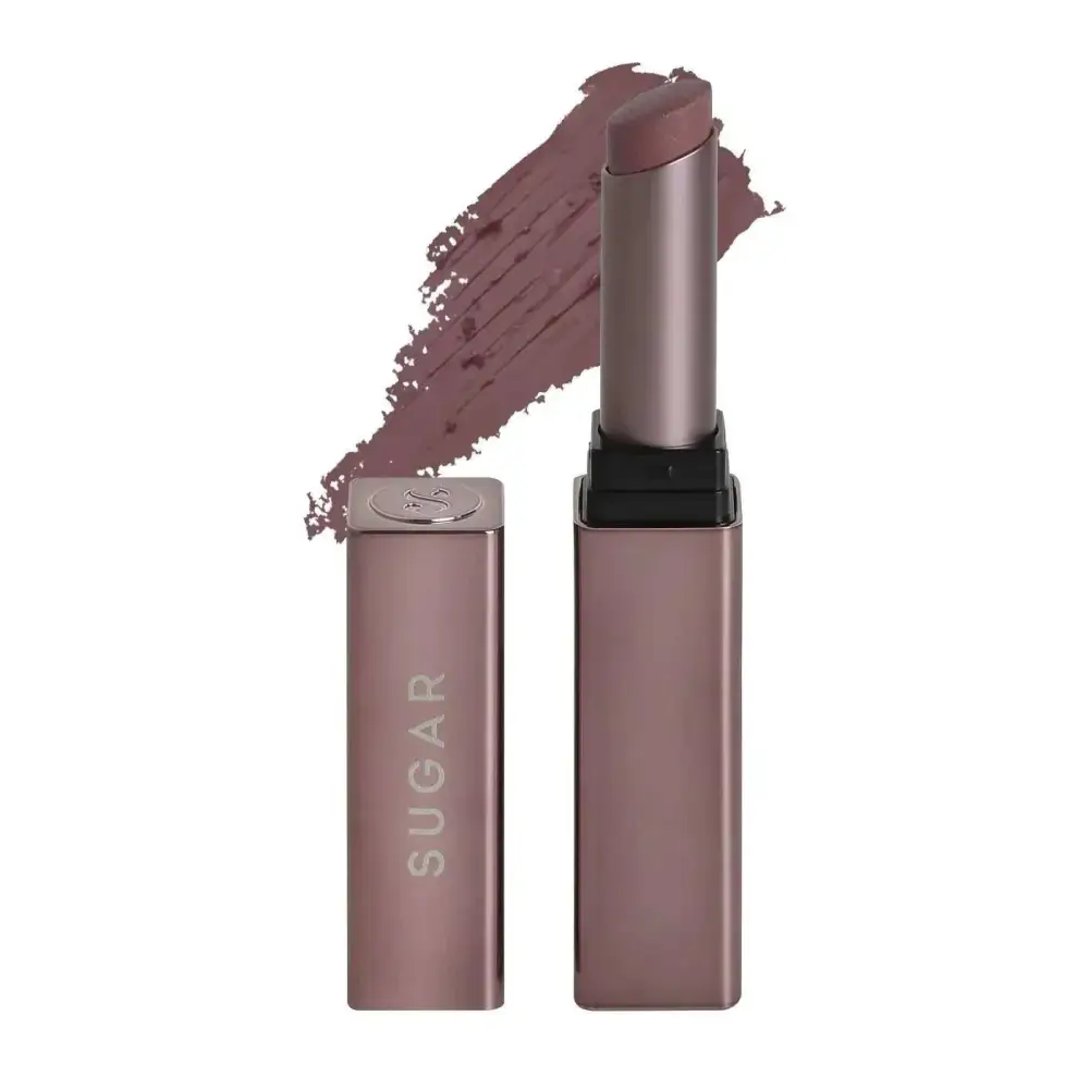 A sleek rose gold metallic tube of sugar cosmetics mettle satin nude pink lipstick with a matte mauve swatch beside it