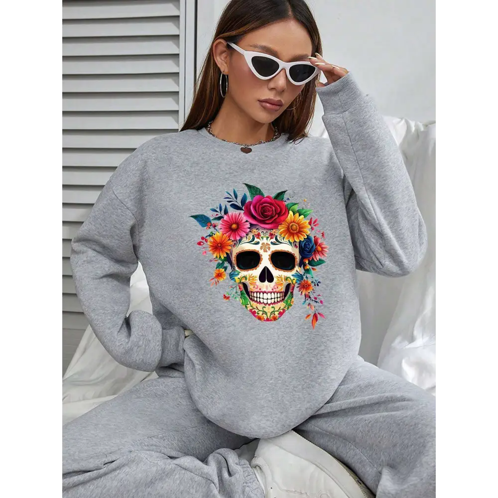 Gray crew neck sweatshirt featuring a vibrant colorful floral skull design for daily wear casual use